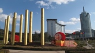 Description: The eight cigarette-shaped pillars are seen outside the headquarters of Yuxi's Hongta  group.
